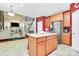 Open concept kitchen boasts island seating and stainless steel refrigerator and appliances at 2003 Dataw Ln, Indian Trail, NC 28079