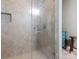 Modern glass enclosed tile shower with neutral tones and hardware at 206 Oxford Place Dr, Fort Mill, SC 29715