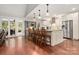 Spacious kitchen with a central island, stainless steel appliances, and hardwood floors perfect for cooking and entertaining at 206 Oxford Place Dr, Fort Mill, SC 29715