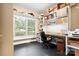 Well lit office featuring built in storage shelving and large picture window at 206 Oxford Place Dr, Fort Mill, SC 29715