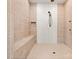 Spacious tiled shower featuring a built in bench and rain shower head at 206 Oxford Place Dr, Fort Mill, SC 29715