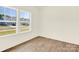 Bedroom offers natural light and neutral walls, ideal for personalization and relaxation at 207 Aspire Cir # 46, Wingate, NC 28174