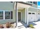 Home's front door has a charming front porch and convenient two-car garage entrance at 207 Aspire Cir # 46, Wingate, NC 28174
