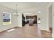 Spacious kitchen features dark cabinets, stainless steel appliances, and a central island at 207 Aspire Cir # 46, Wingate, NC 28174