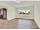 Bright, airy living room with hardwood floors and large windows offering plenty of natural light at 207 Aspire Cir # 46, Wingate, NC 28174