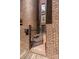 Exterior photo of a brick building and gate leading to the entrance at 217 W 8Th St, Charlotte, NC 28202
