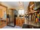 An inviting kitchen showcases stainless steel appliances, colorful tile, and a stainless steel countertop at 217 W 8Th St, Charlotte, NC 28202