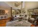 Bright and airy living room showcasing a modern staircase, hardwood floors, and large windows at 217 W 8Th St, Charlotte, NC 28202