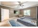 Spacious bedroom featuring ceiling fan, carpet, window and a stylish platform bed frame with area rug at 2202 Chickasaw Loop, Rock Hill, SC 29732
