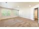 Large bedroom with neutral paint, plush carpet, recessed lighting, and multiple windows at 2202 Chickasaw Loop, Rock Hill, SC 29732