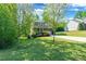 Well-manicured lawn surrounds this two story home, creating a welcoming and picturesque setting at 2202 Chickasaw Loop, Rock Hill, SC 29732