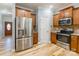 Modern kitchen with stainless steel appliances, wood cabinets, and hardwood floors at 2202 Chickasaw Loop, Rock Hill, SC 29732