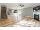 Open living space featuring fireplace, staircase and updated kitchen at 2202 Chickasaw Loop, Rock Hill, SC 29732