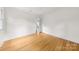Bright bedroom with hardwood floors and plenty of natural light at 2411 Ainsdale Rd, Charlotte, NC 28226