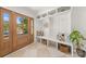 Charming mudroom features built-in storage, bench seating, and stylish tile flooring at 2411 Ainsdale Rd, Charlotte, NC 28226