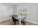 Breakfast nook with a table and seating, and a large window with natural light at 247 Timberland Loop, Mooresville, NC 28115