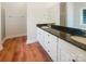 Bathroom featuring a double vanity with granite countertops and ample cabinet storage at 249 Arrowood Ave, Lancaster, SC 29720