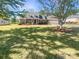 Charming brick home with a large front yard, mature trees, and inviting curb appeal at 249 Arrowood Ave, Lancaster, SC 29720