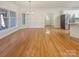 Spacious living room with wood floors, a large window and an open layout at 249 Arrowood Ave, Lancaster, SC 29720