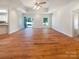 Open-concept living space with hardwood floors and a bright, welcoming atmosphere at 249 Arrowood Ave, Lancaster, SC 29720
