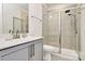 Modern bathroom featuring a sleek vanity with contemporary fixtures and glass enclosed shower stall at 2520 Ensemble Ct, Charlotte, NC 28262