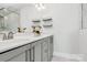 Stylish bathroom featuring dual vanity, marble countertops, and modern fixtures at 2520 Ensemble Ct, Charlotte, NC 28262