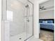 Modern bathroom features a glass enclosed shower and access to a bedroom at 2520 Ensemble Ct, Charlotte, NC 28262