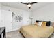 A nicely decorated bedroom with unique wall art and natural light at 2520 Ensemble Ct, Charlotte, NC 28262
