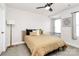 Well-lit bedroom with a ceiling fan and lots of natural light at 2520 Ensemble Ct, Charlotte, NC 28262