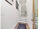 Bright entryway with hardwood floors, white walls, and staircase leading to the upper level at 2520 Ensemble Ct, Charlotte, NC 28262
