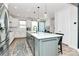Modern kitchen with a large center island, stainless steel appliances, and plenty of storage space at 2520 Ensemble Ct, Charlotte, NC 28262