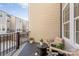 Outdoor patio with seating offers a cozy space with modern black railings and a great view at 2558 Deacon Ave, Charlotte, NC 28204