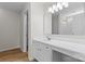 Clean bathroom with a long vanity, ample storage, and a view into the shower and toilet area at 2708 N Valley Ct, Charlotte, NC 28273
