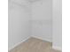 Walk-in closet featuring carpeted floors and wire shelving for easy storage and organization at 2708 N Valley Ct, Charlotte, NC 28273