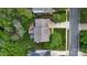 Aerial view of a home featuring a large backyard, patio, and a well-manicured lawn at 2710 Providence Spring Ln, Charlotte, NC 28270