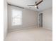 Bedroom featuring a ceiling fan and window with blinds at 2710 Providence Spring Ln, Charlotte, NC 28270