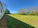 The property features a sprawling backyard with a large green field at 2822 Hugh Rd, Shelby, NC 28150