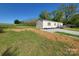 Single-story home with a front porch, complemented by a large, grassy yard at 2822 Hugh Rd, Shelby, NC 28150
