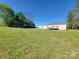 Well-maintained single-story home featuring an expansive grassy yard and a front deck at 2822 Hugh Rd, Shelby, NC 28150