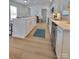 Well-lit kitchen with white cabinets, stainless steel appliances, and a kitchen island at 2822 Hugh Rd, Shelby, NC 28150