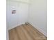 Cozy laundry room featuring vinyl flooring, hookups, and white walls at 2822 Hugh Rd, Shelby, NC 28150