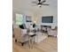 Cozy living room with a ceiling fan, neutral furniture, and a large television at 2822 Hugh Rd, Shelby, NC 28150