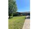 Charming single-story brick home with a well-manicured lawn and mature shade tree at 28344 Canton Rd, Albemarle, NC 28001
