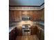 Kitchen featuring wood cabinets, stainless steel appliances, and granite countertops at 28344 Canton Rd, Albemarle, NC 28001