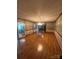 Spacious living room features hardwood floors, neutral walls, and an open floor plan at 28344 Canton Rd, Albemarle, NC 28001