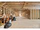 Large unfinished attic space with exposed rafters and beams, awaiting customization at 29268 Pennington Rd, Albemarle, NC 28001