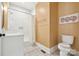 Bathroom with white subway tile, stylish vanity, and patterned tile floor at 29268 Pennington Rd, Albemarle, NC 28001