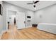 Second bedroom with hardwood floors, a ceiling fan, and bright natural light at 29268 Pennington Rd, Albemarle, NC 28001