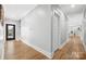 Hallway with hardwood floors leading to bedrooms or other living areas at 29268 Pennington Rd, Albemarle, NC 28001