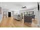 Bright living room with hardwood floors open to kitchen and outdoor access at 29268 Pennington Rd, Albemarle, NC 28001